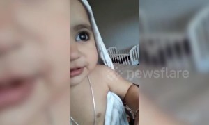 Chilly baby makes hilarious noise after coming out of shower