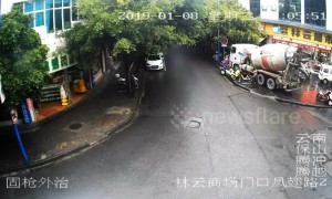 Driverless cement truck slides downhill and crashes onto pavement