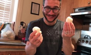 Dad uses weird genius hack to peel egg