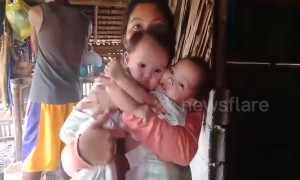 Filipino mother pleads for help to separate her four-month-old conjoined twin daughters