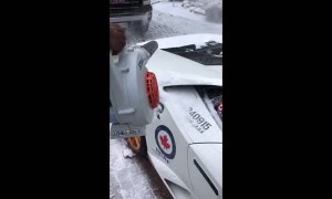 Fastest way to clear snow off a Lamborghini
