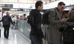 Hugh Jackman mobbed by fans as he arrives in Japan