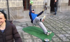 Street performing goalkeeper wows audience by defying gravity