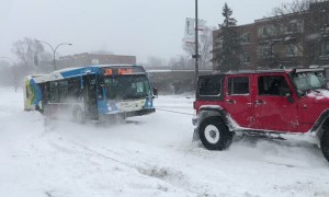 Team of Trucks Saves a Bus