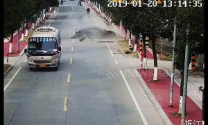 Street sweeper has near miss when out-of-control car smashes into a tree