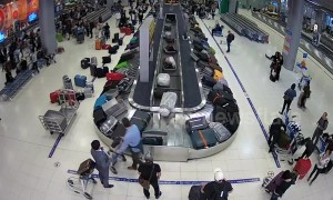 German thief, 39, caught stealing British woman's suitcase from airport baggage carousel