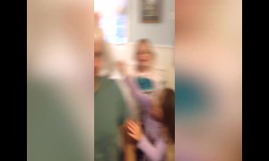 Mom Laughs at Dad who has Fallen Victim to Dress-Up