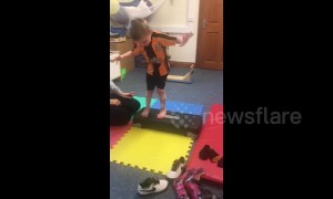 Inspirational moment boy with cerebral palsy walks without splints