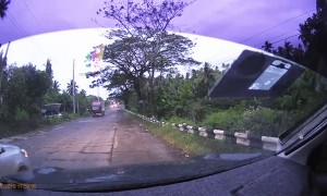 Bus Takes out Tricycle
