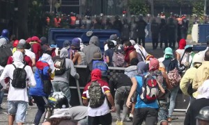 Clashes on the streets of Caracas as Venezuela stages mass protests