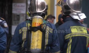 Man in Greek bank threatens to self immolate, set building alight