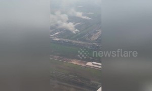 Aerial footage shows Thai farmers burning crops in smog-ravaged Bangkok