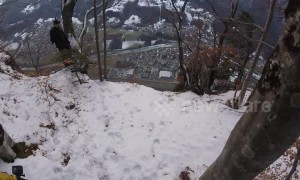 Basejumper does dizzying triple somersault into Alpine valley