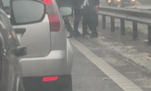 Hasidic Jewish Men Dance in Traffic