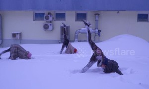 Snow-ga! Russians do yoga in sub-zero conditions