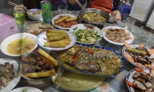 Chinese man shows off sumptuous family feast on Lunar New Year's Eve