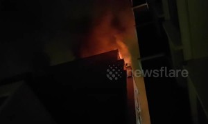 Moment firefighters attempt to enter burning Paris apartment block