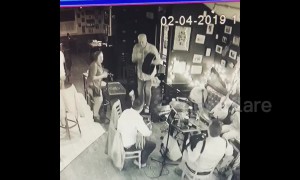 Funny moment musician falls into whiskey barrel during Irish music jam in Massachusetts