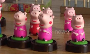 Folk artists make Peppa Pig toys out of dough for the Year of the Pig