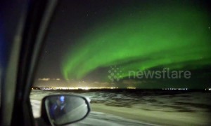 Car passenger films spectacular aurora display in Iceland