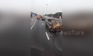 Tanks on outskirts of Bangkok spark coup fears