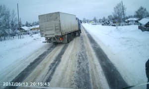 Woman Lies Down in Front of Approaching Truck
