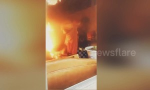 Heroic fireman risks life to drag burning gas cylinder out of house