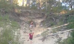 Girl on Snowboard Face-Plants into Sand