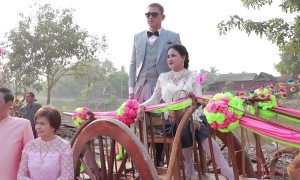 Couples get married in cow-drawn wooden carts to mark Valentine's Day