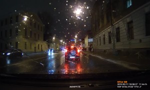 Ice From Roof Falls Onto Walking Pedestrians