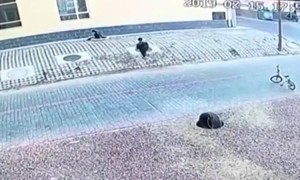 Boy falls through manhole but manages to climb out singlehanded