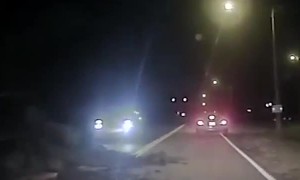 Huge rockslide causes car to flip onto police cruiser