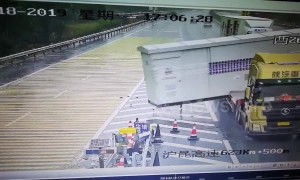 Huge storage unit falls off truck braking on Chinese motorway