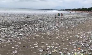 Shocking footage of Bali beach swamped by plastic waste