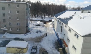 Snow Falling From Roof Pummels Woman