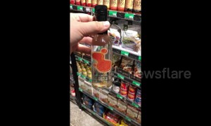 Shake before use! Hot sauce strong as pepper spray turns red when shaken