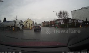 Heart-stopping moment T-boned car spins into lamppost in Stockport