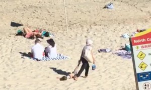 Uncooperative Child Dragged Along Beach