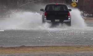 Ontario's main roads swallowed by fast moving rivers during storm surge