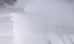 Train Travels Through Massive Snow Drift