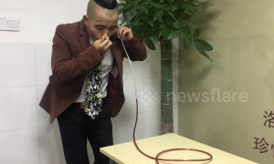 Chinese man is able to drink red wine from glass through his EARS
