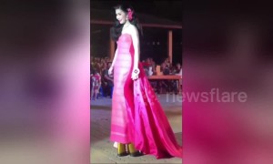 Thai woman takes a tumble when showing off her mega 18-inch heels