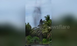 Workers in the Philippines accidentally strike oil and gas deposits making it spurt out of the ground