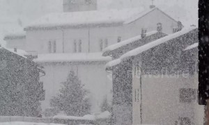 Dense snow nearly whites out northern Italy town