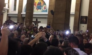 Venezuelans show support for Guaido in church after return to country