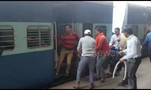 Terrifying moment passenger is saved from going under train