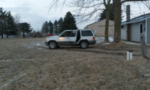 Car Tied To Tree Drives Off