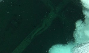 Icy Underwater Crucifix