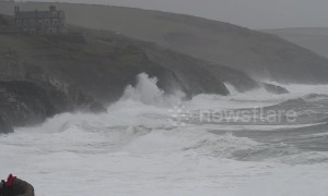 Waves smash UK coast as Storm Gareth tightens its grip