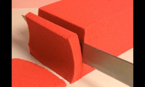 Satisfying compilation of kinetic sand being cut